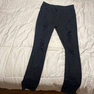 Cut-Out Skinny Cropped Black Jeans.